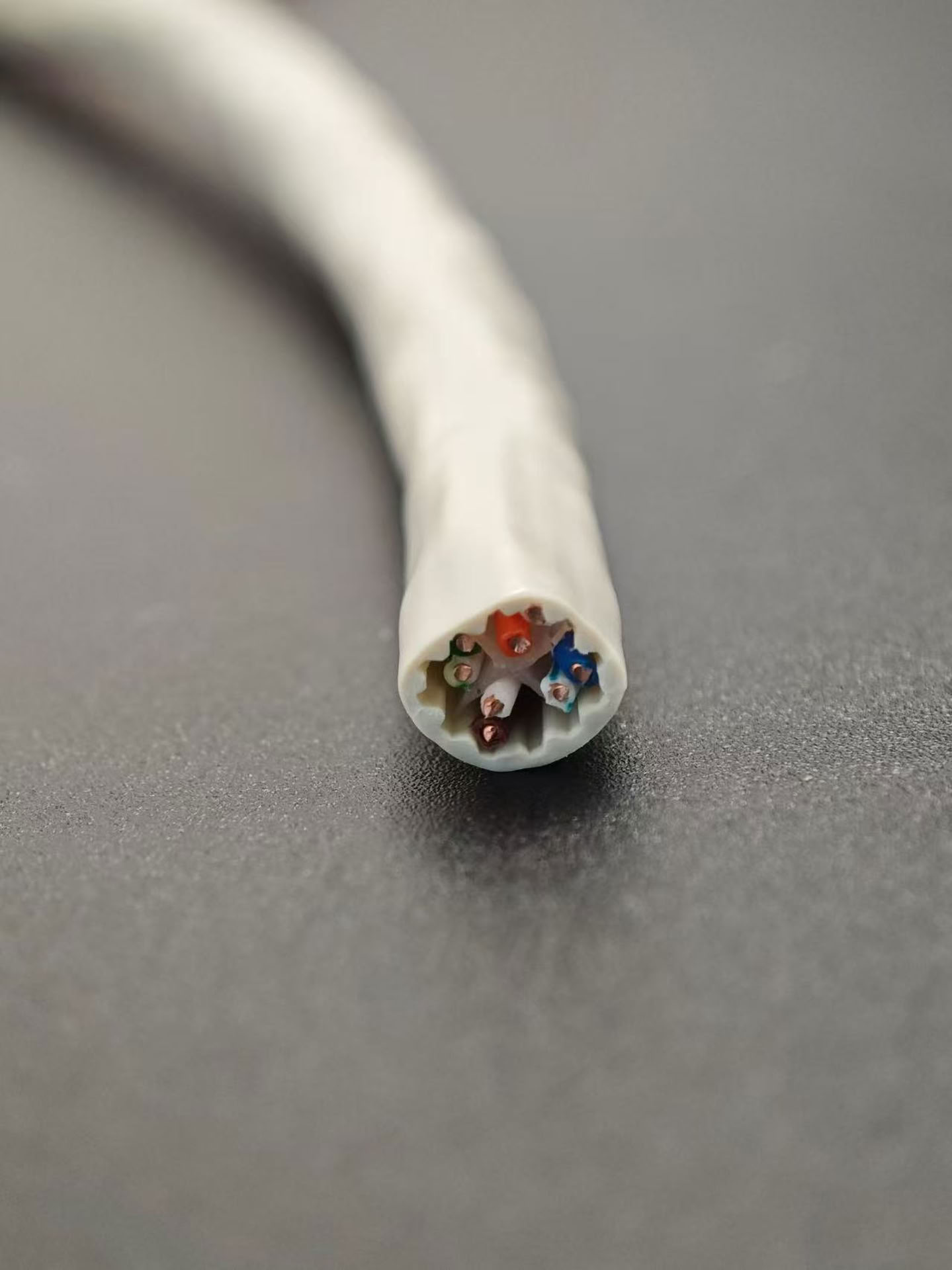 Close-up of a white Cat6A UTP cable cross-section